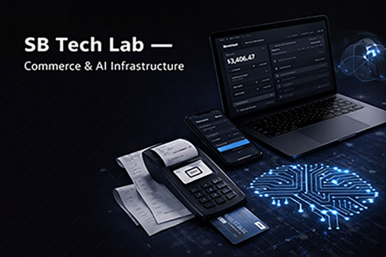 SB Tech Lab workspace with screens showing commerce, AI, and infrastructure dashboards